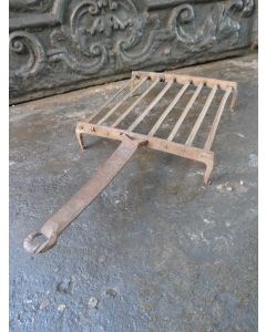 Antigua parrilla de hierro